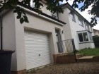 Front garden and garage