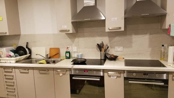 Kitchen- 2 HOBs, 2 Ovens, 2 Fridge/Freezers, sink. Includes communal cookware, not crockware