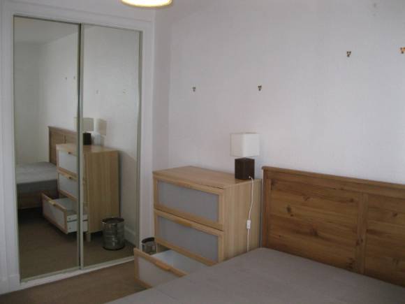 Fitted wardrobe in bedroom